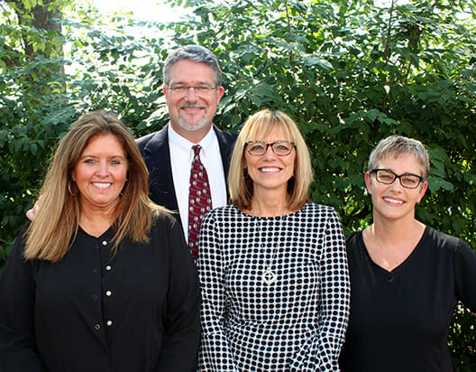 Dr. TJ Miller II and front desk team, Tami, Donna, Johanna